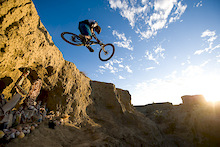 Randy jumping over our shrine at sunset...